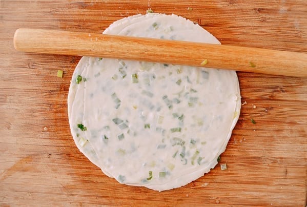 Rolling out scallion pancakes, thewoksoflife.com