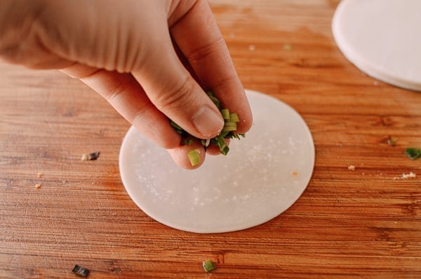 Layering scallions to make scallion pancakes, thewoksoflife.com