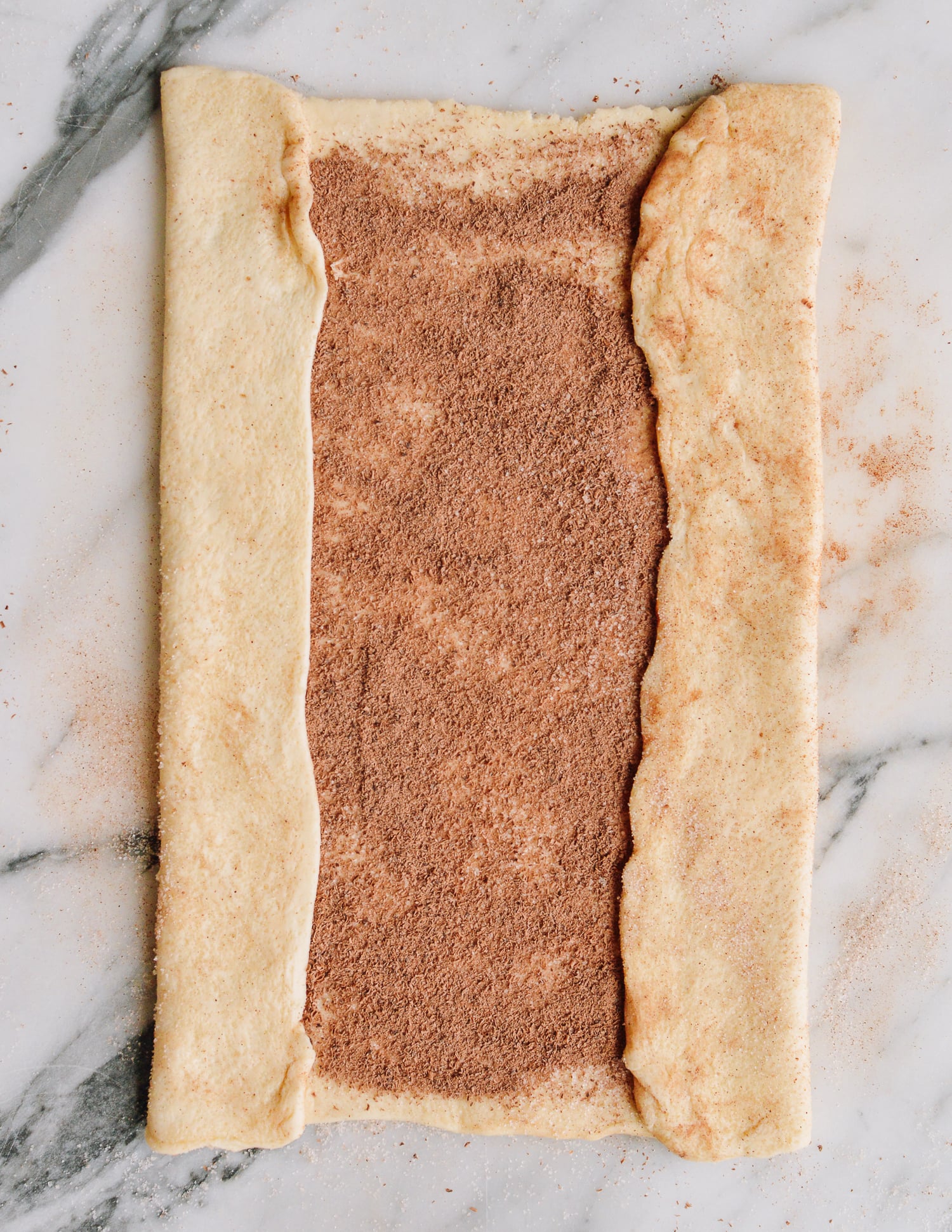 Folding puff pastry to make chocolate palmiers, thewoksoflife.com