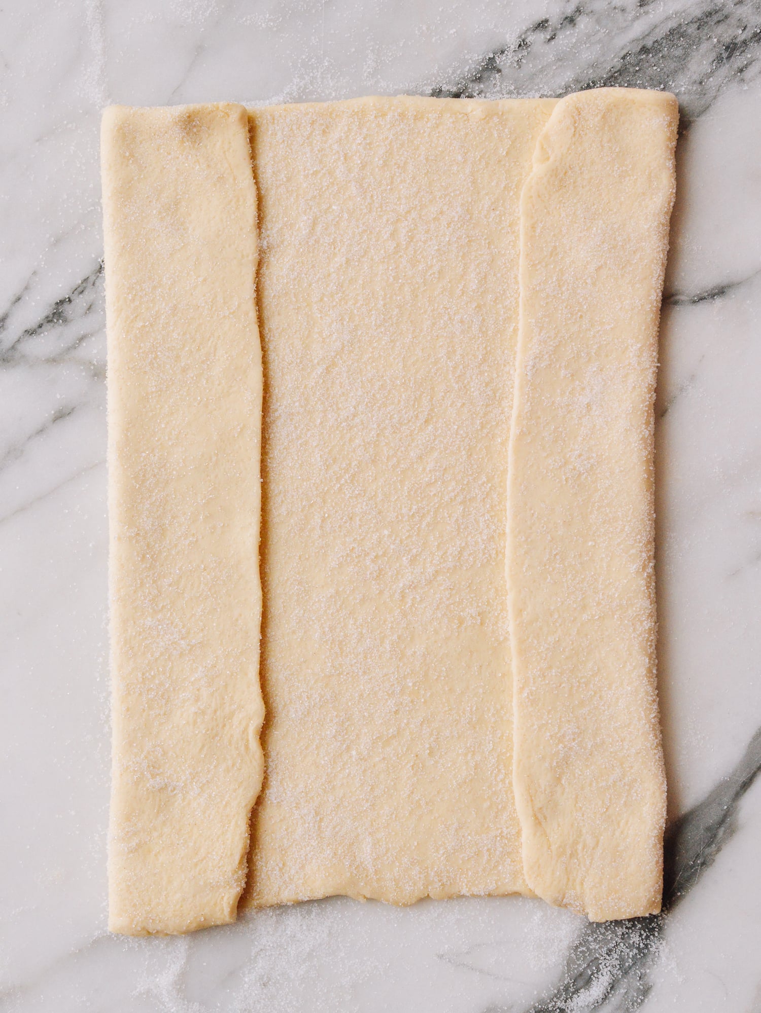 Folding puff pastry to make palmiers, thewoksoflife.com