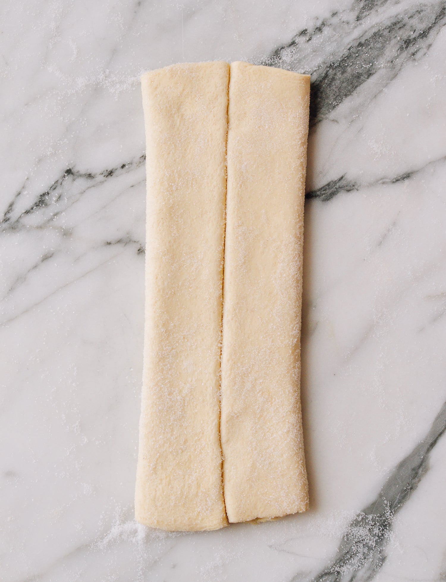 Folding puff pastry to make palmiers, thewoksoflife.com