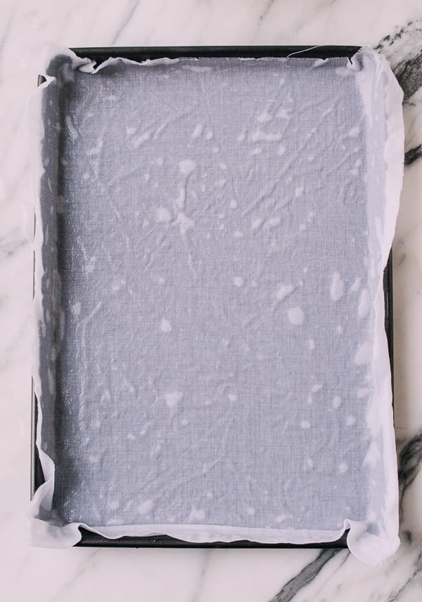 Pan lined with clean cloth, thewoksoflife.com