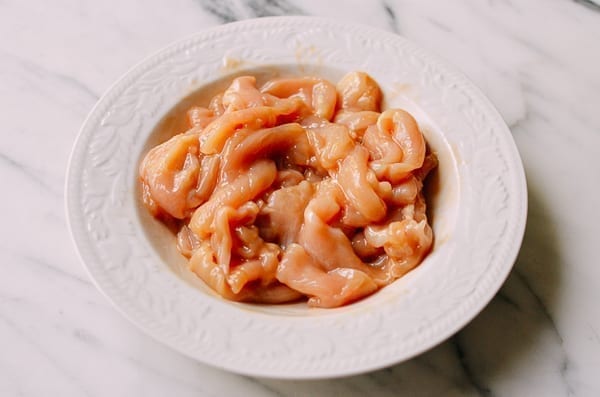 Marinated sliced chicken for stir-fry, thewoksoflife.com