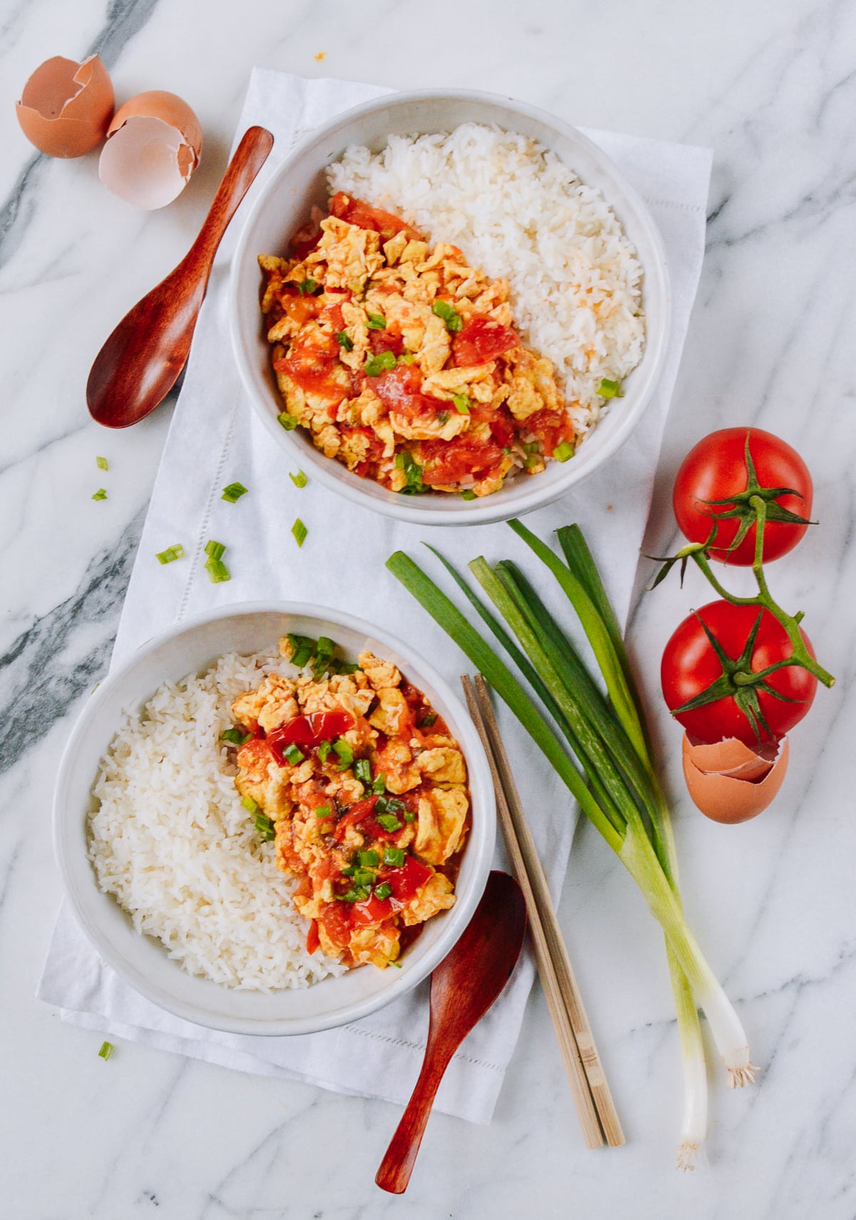 Bowls of Chinese Tomato Egg with Rice, thewoksoflife.com