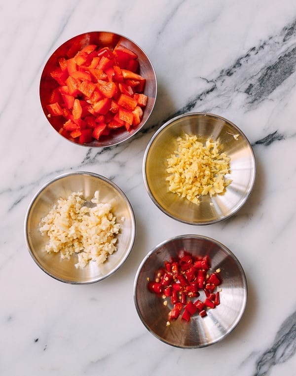 Diced bell peppers, garlic, ginger, and chilies, thewoksoflife.com