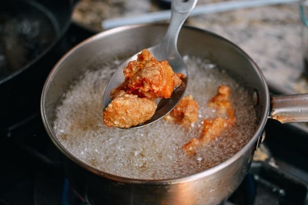 Frying chicken pieces, thewoksoflife.com