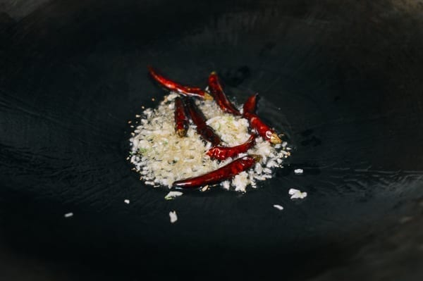 Dried chili peppers and minced garlic, thewoksoflife.com