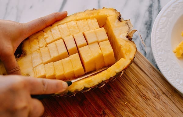 Removing pineapple chunks, thewoksoflife.com