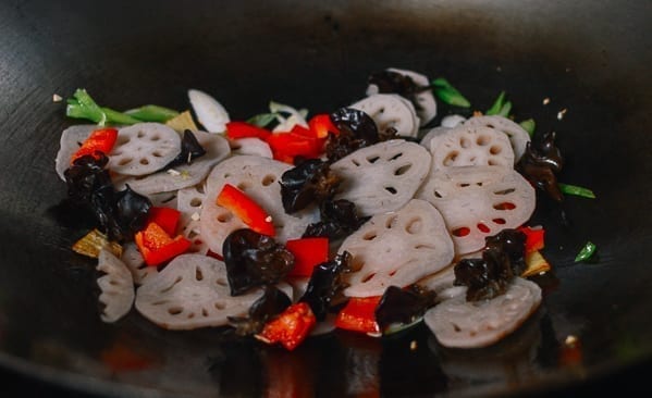 Adding the blanched vegetables, thewoksoflife.com