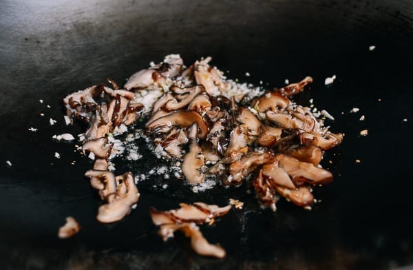 Garlic and shiitake mushrooms in wok, thewoksoflife.com