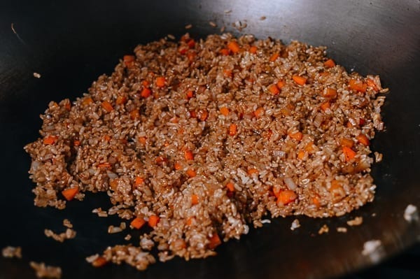 Stirring sauce into rice, thewoksoflife.com