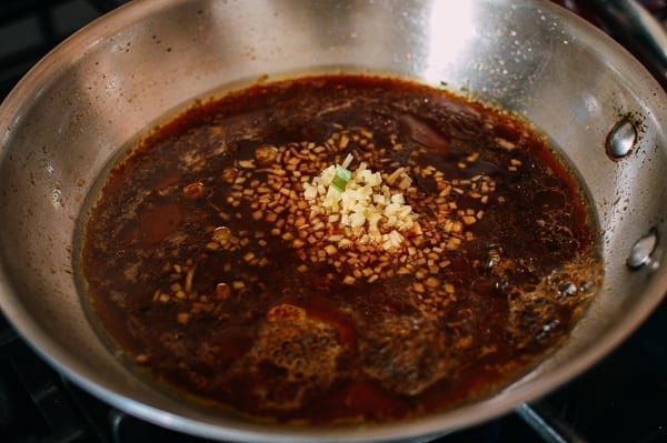 Adding ginger to sauce, thewoksoflife.com