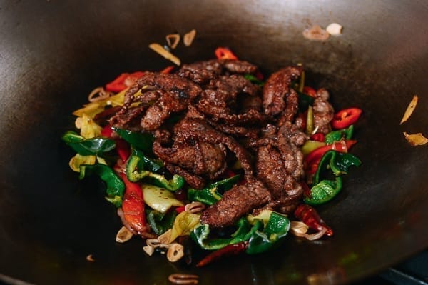 Adding fried beef, thewoksoflife.com