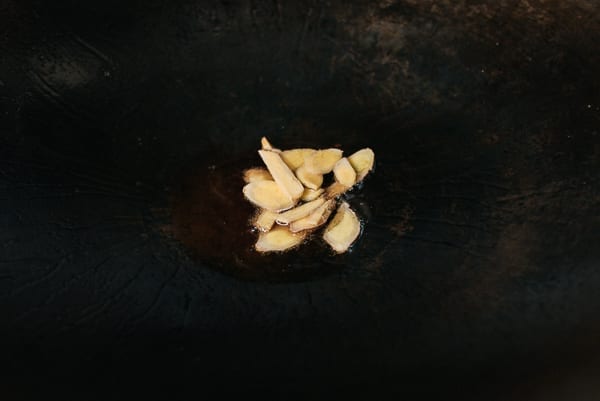 Adding ginger to oil, thewoksoflife.com