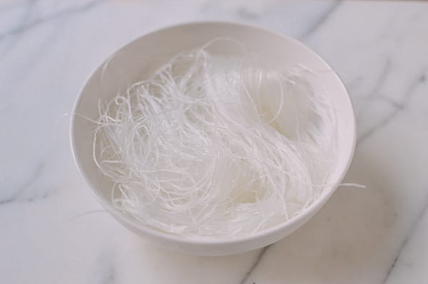 Soaking glass noodles in water, thewoksoflife.com