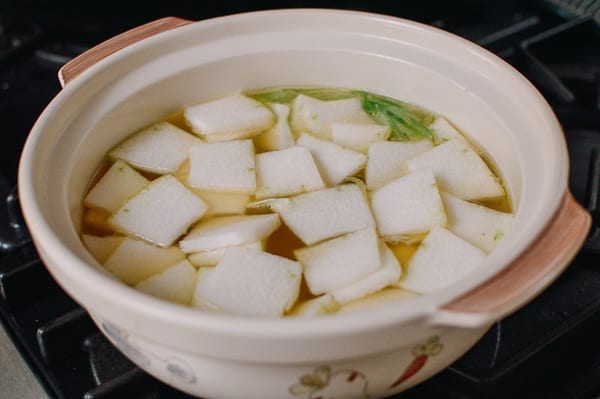 Adding winter melon to soup, thewoksoflife.com