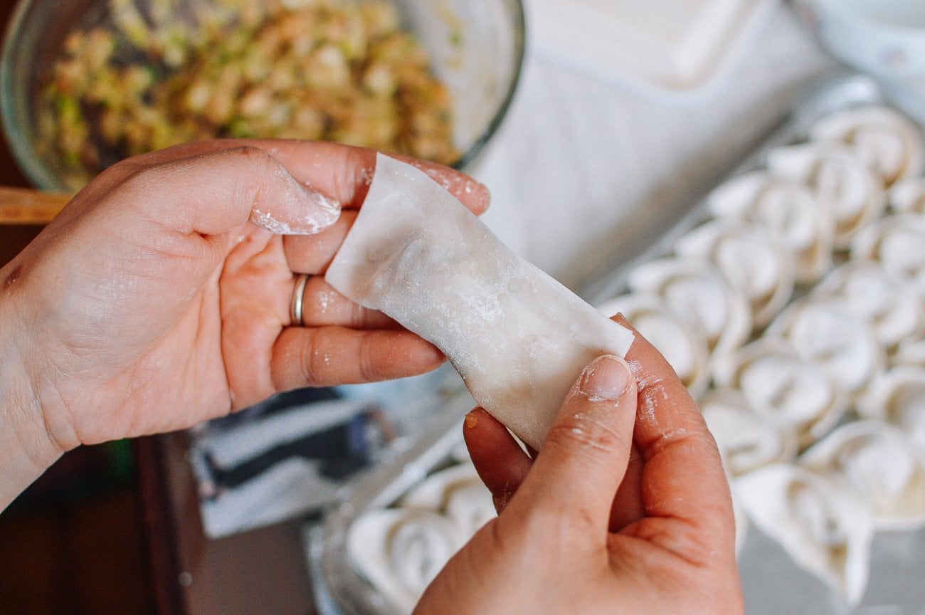 wonton wrapper folded in half around filling
