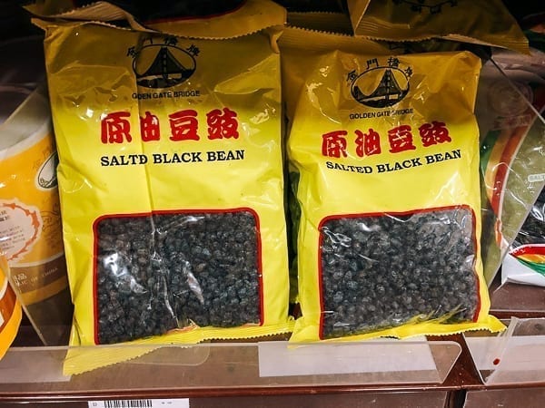 Bag of salted black beans on store shelf, thewoksoflife.com