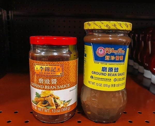 Ground Bean Sauce products on shelves, thewoksoflife.com