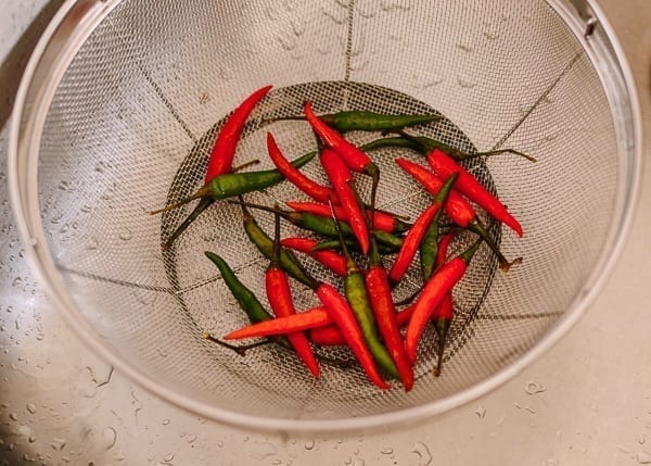 Chilies in colander, thewoksoflife.com