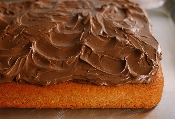Yellow cake with chocolate frosting, thewoksoflife.com