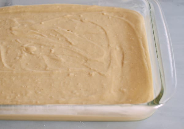 Cake batter in 13x9 inch pan, thewoksoflife.com