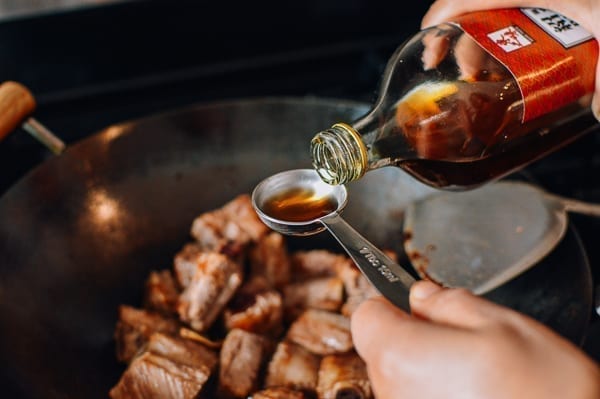 Adding 1 tablespoon shaoxing wine, thewoksoflife.com