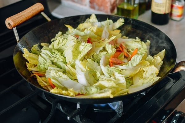 Stirring in napa cabbage, thewoksoflife.com