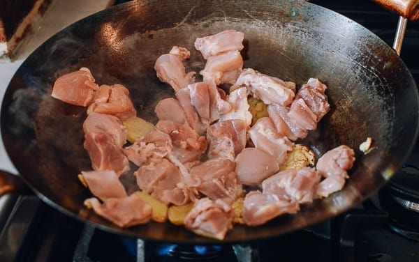 Chicken thighs in wok, thewoksoflife.com