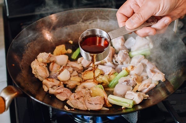 Adding Shaoxing wine, thewoksoflife.com