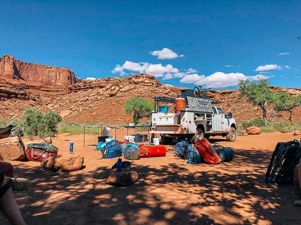 Camping gear unloaded from support vehicle at potato bottom campground by thewoksoflife.com