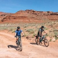 Bill and friend biking in Moab, Utah - thewoksoflife.com