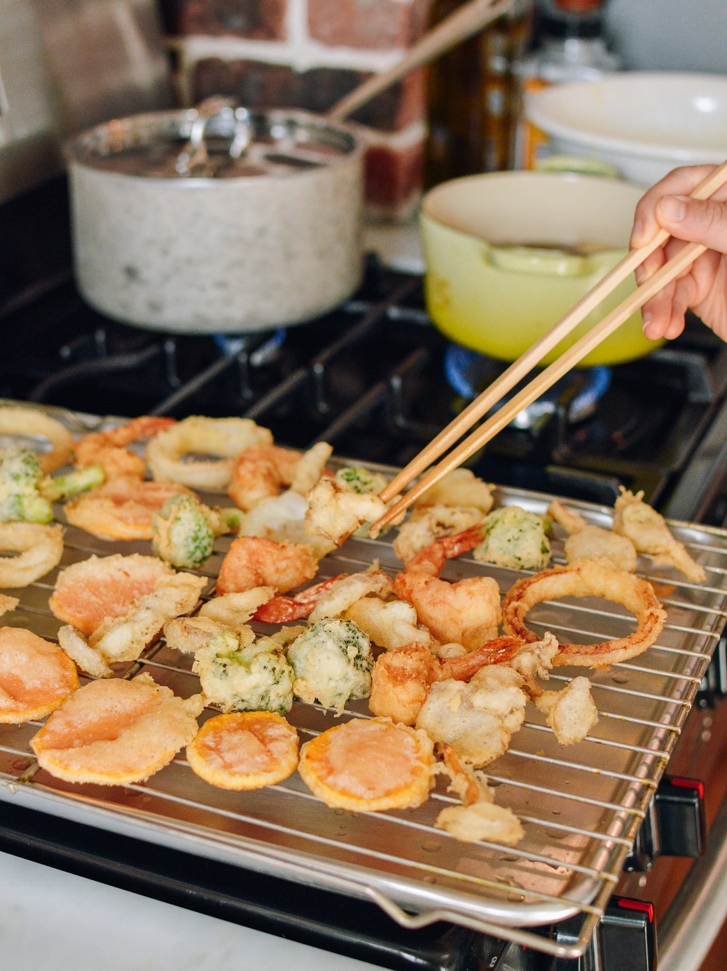 Transferring fried tempura to wire rack, thewoksoflife.com