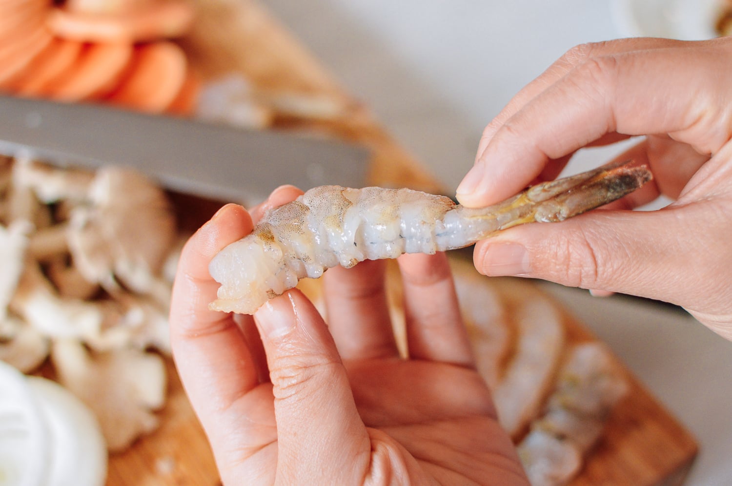 Shrimp that has been scored to lay flat, thewoksoflife.com