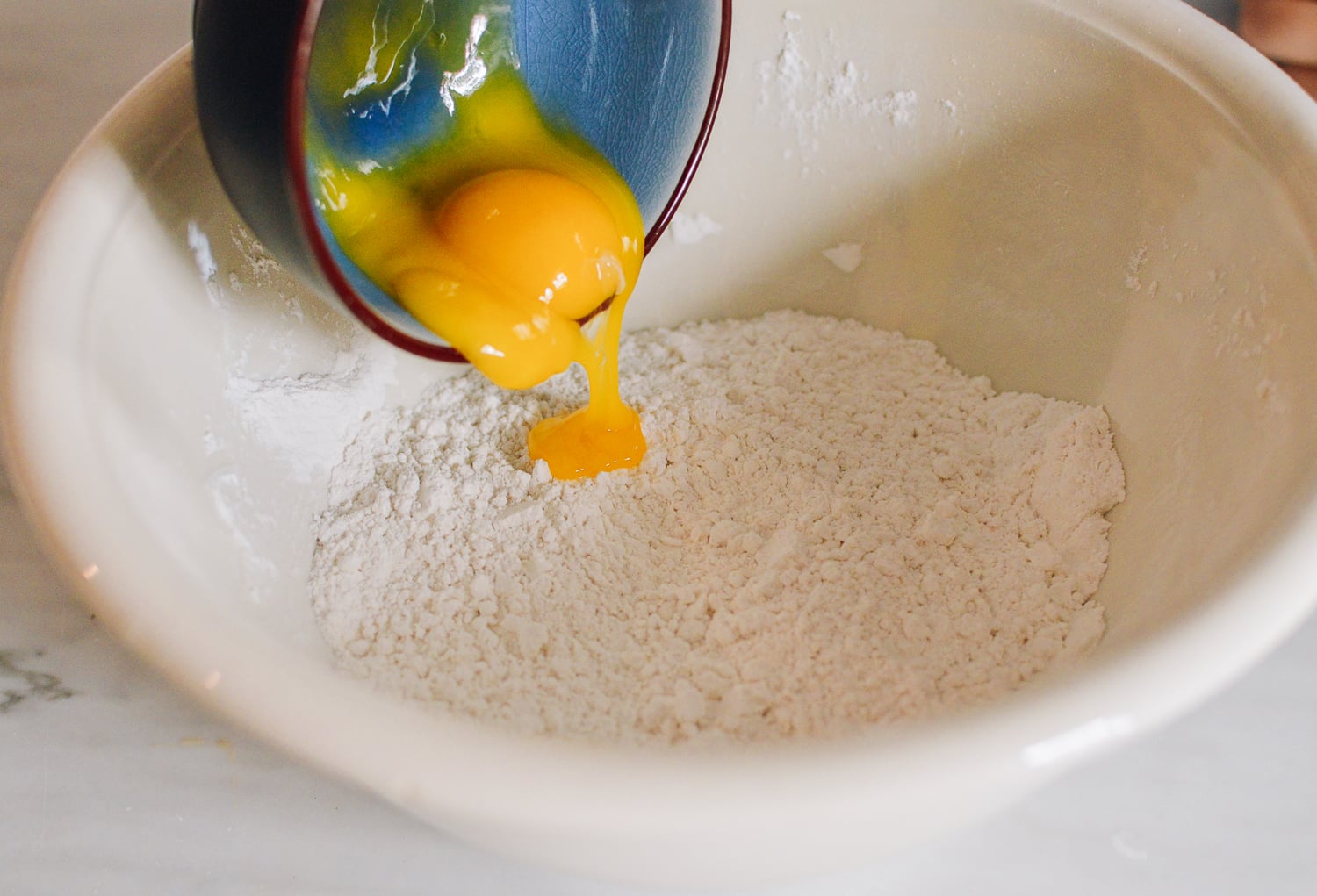 Making tempura batter with cake flour, egg yolks, and water, thewoksoflife.com