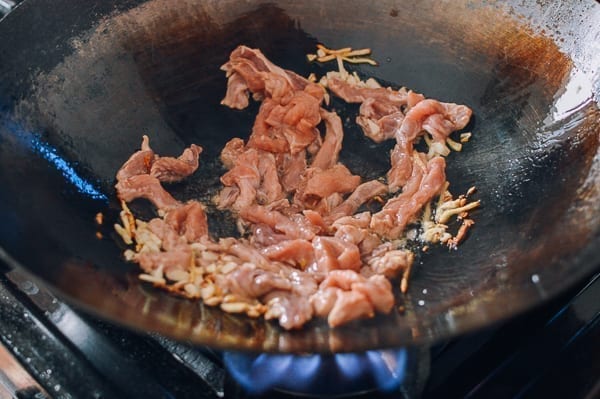 Cooking julienned pork with ginger and garlic, thewoksoflife.com