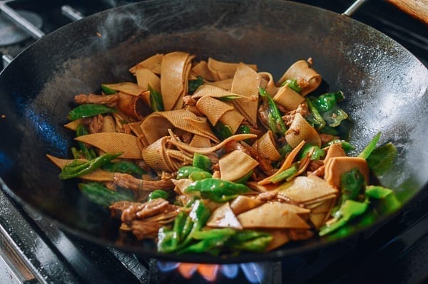 Adding Tofu Sheets and Peppers, thewoksoflife.com