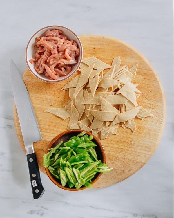 Marinated pork, sliced tofu sheets, and sliced peppers, thewoksoflife.com