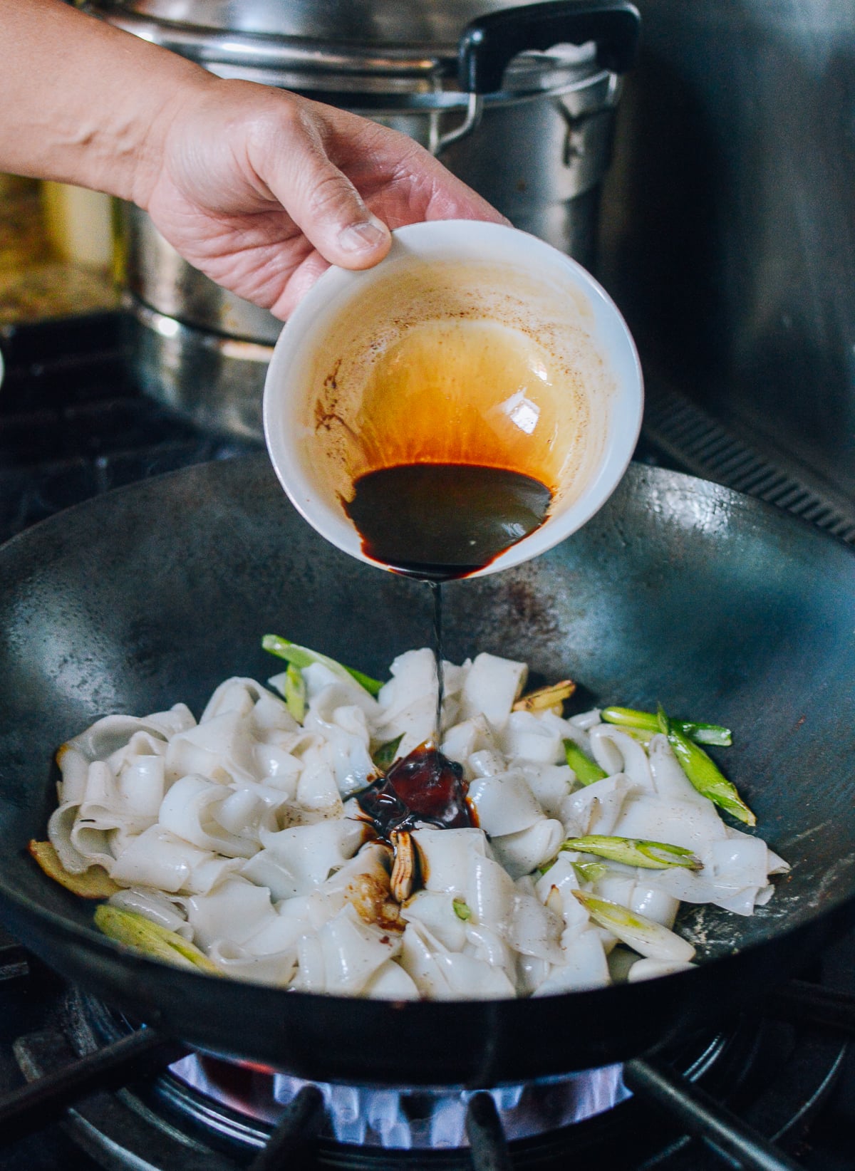 Adding sauce mixture, thewoksoflife.com