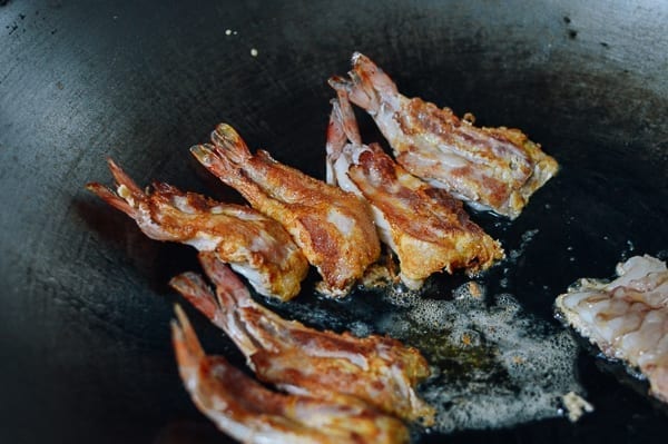 Butterfly shrimp cooking in wok, thewoksoflife.com