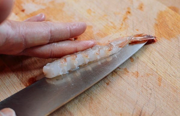 Butterflying shrimp from the underside, thewoksoflife.com