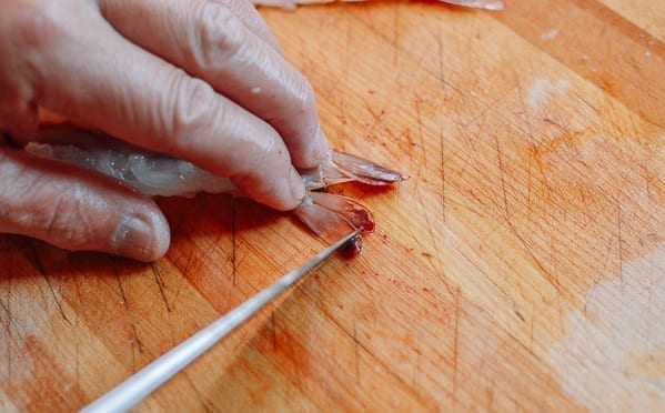 Scraping shrimp tail, thewoksoflife.com