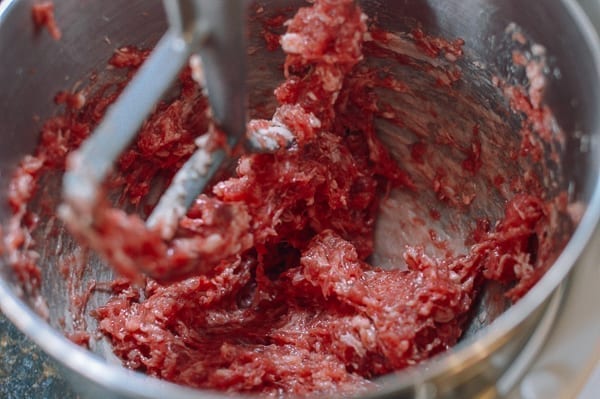 Beating ground beef in mixer with paddle attachment, thewoksoflife.com