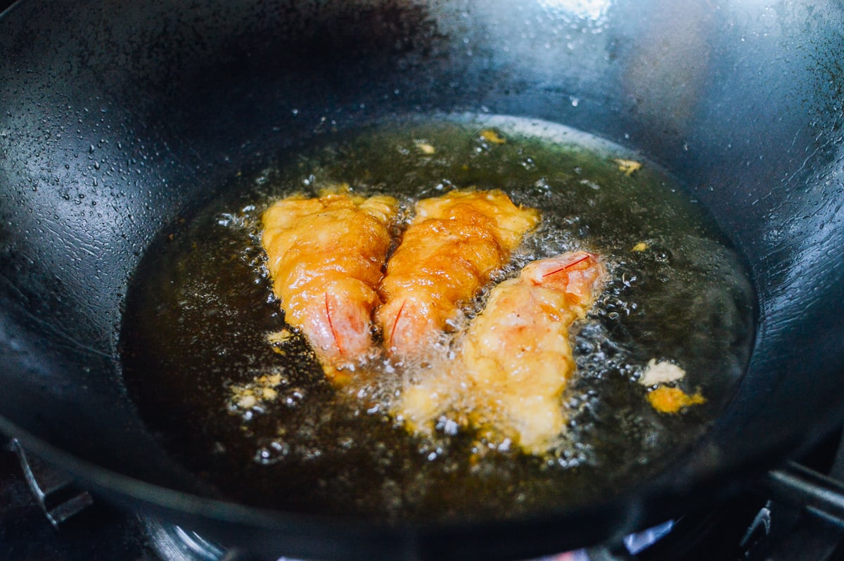 Frying fantail shrimp, thewoksoflife.com