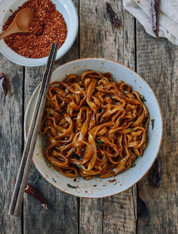 Bowl of homemade noodles mixed with sauce, thewoksoflife.com