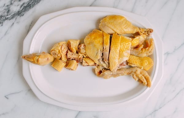 Placing thigh and drumstick on platter, thewoksoflife.com