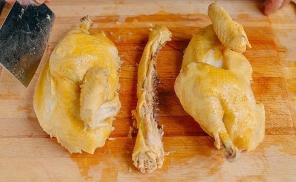 Two chicken halves and backbone, thewoksoflife.com