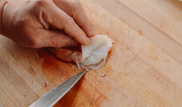 Opening up butterflied shrimp