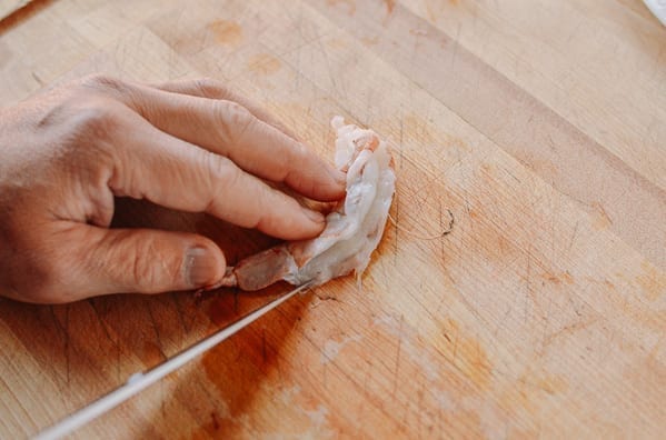 Butterflying shrimp from the back and de-veining it