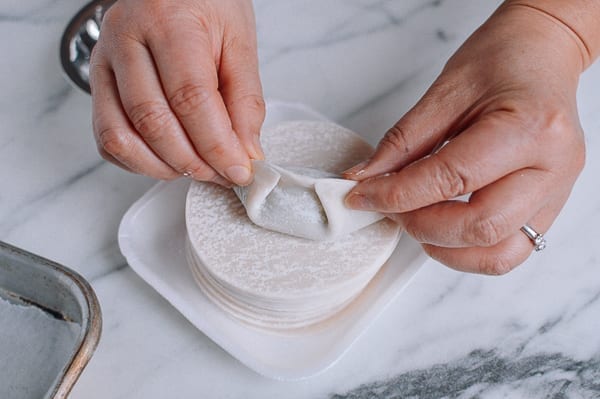 Sealing double pleated dumpling, thewoksoflife.com